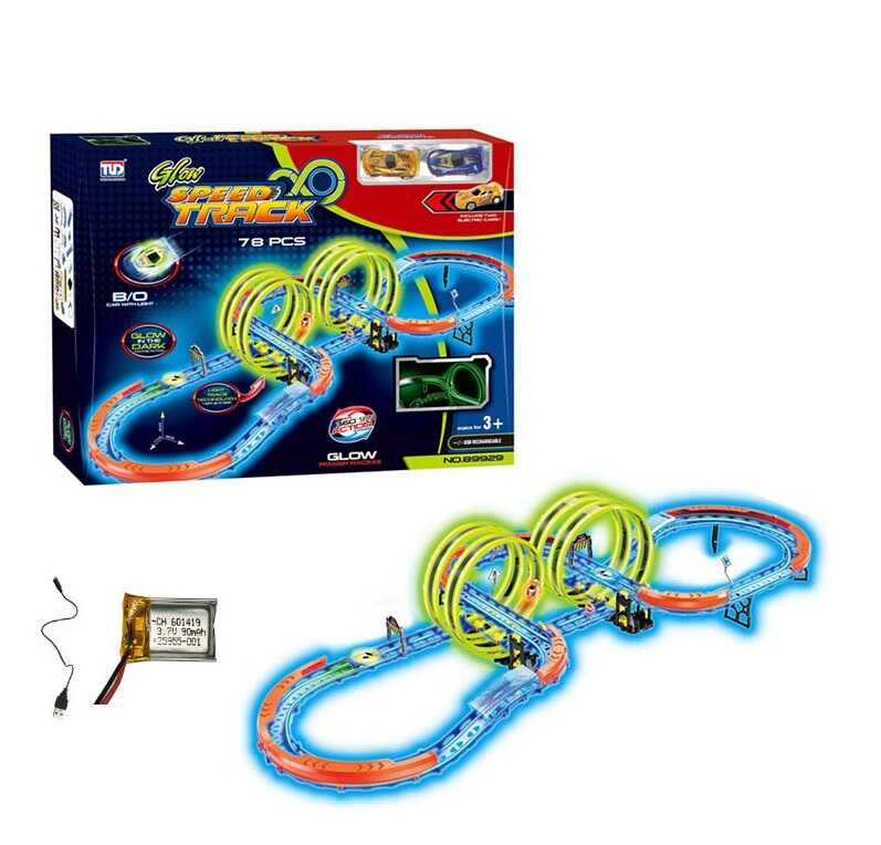 Трек 89929 (12) 78 елементів, 2 машинки на акумуляторі 3.7V, підсвічування, світиться у темряві, трюки, муляжі оточення, в коробці